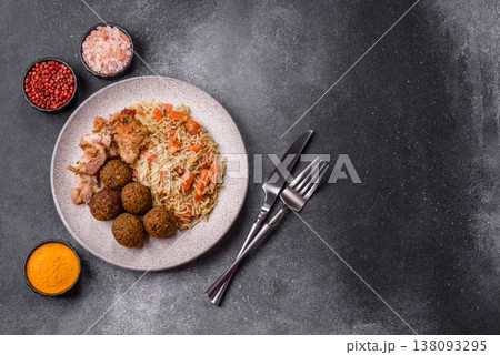 Kabsa or mandi, an Arabic dish with rice and chicken, salt, and spices. Kabsa or mandi 138093295