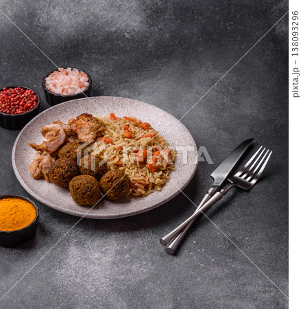 Kabsa or mandi, an Arabic dish with rice and chicken, salt, and spices. Kabsa or mandi Kabsa or mandi, an Arabic dish with rice and chicken, salt, and spices. Kabsa or mandi 138093296