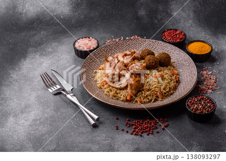 Kabsa or mandi, an Arabic dish with rice and chicken, salt, and spices. Kabsa or mandi 138093297