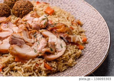 Kabsa or mandi, an Arabic dish with rice and chicken, salt, and spices. Kabsa or mandi 138093303