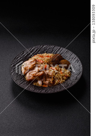 Kabsa or mandi, an Arabic dish with rice and chicken, salt, and spices. Kabsa or mandi 138093309