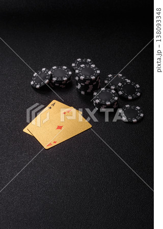 Playing cards and chips on a table, a gambling game of blackjack or baccarat. Cards and chips 138093348