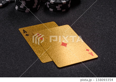 Playing cards and chips on a table, a gambling game of blackjack or baccarat. Cards and chips 138093354