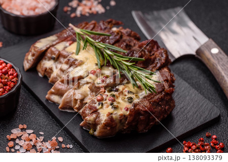 Steak, beef or pork meat grilled or barbecued with salt and spices. Beef steak Steak, beef or pork meat grilled or barbecued with salt and spices. Beef steak 138093379
