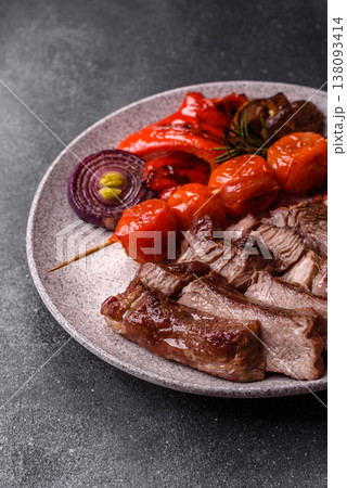 Steak, beef or pork meat grilled or barbecued with salt and spices. Beef steak 138093414