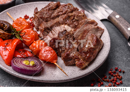 Steak, beef or pork meat grilled or barbecued with salt and spices. Beef steak 138093415