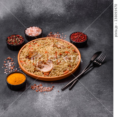 Kabsa or mandi, an Arabic dish with rice and chicken, salt, and spices. Kabsa or mandi 138093470