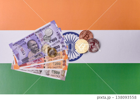 A conceptual financial background, Bitcoin against the Rupee. Bitcoin on the Indian currency A conceptual financial background, Bitcoin against the Rupee. Bitcoin on the Indian currency 138093558