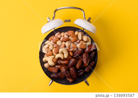 Dried dates on a ceramic plate for Ramadan or Iftar. Dried dates 138093587