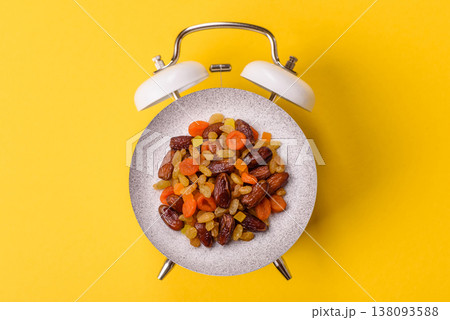 Dried apricots, raisins, and candied fruits as ingredients for baked goods and sweets. Dried fruits Dried apricots, raisins, and candied fruits as ingredients for baked goods and sweets. Dried fruits 138093588