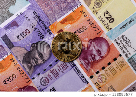 A conceptual financial background, Bitcoin against the Rupee. Bitcoin on the Indian currency A conceptual financial background, Bitcoin against the Rupee. Bitcoin on the Indian currency 138093677