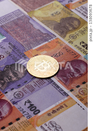 A conceptual financial background, Bitcoin against the Rupee. Bitcoin on the Indian currency A conceptual financial background, Bitcoin against the Rupee. Bitcoin on the Indian currency 138093678
