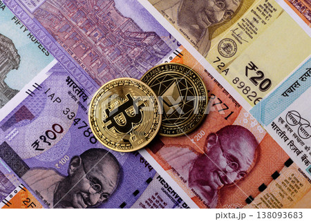 A conceptual financial background, Bitcoin against the Rupee. Bitcoin on the Indian currency A conceptual financial background, Bitcoin against the Rupee. Bitcoin on the Indian currency 138093683