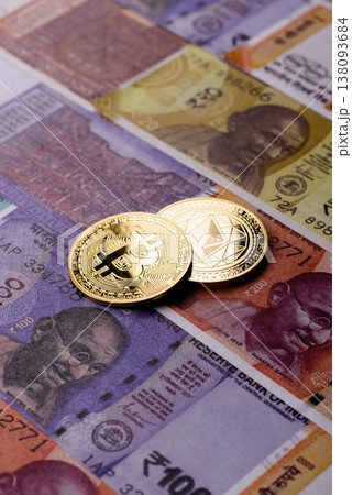 A conceptual financial background, Bitcoin against the Rupee. Bitcoin on the Indian currency A conceptual financial background, Bitcoin against the Rupee. Bitcoin on the Indian currency 138093684