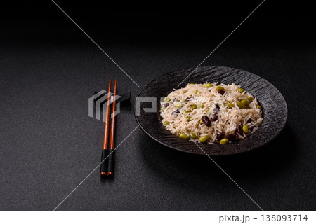 Asian food with rice, edamame, carrots, tofu, and spices. Rice with edamame Asian food with rice, edamame, carrots, tofu, and spices. Rice with edamame 138093714