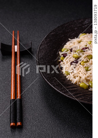 Asian food with rice, edamame, carrots, tofu, and spices. Rice with edamame Asian food with rice, edamame, carrots, tofu, and spices. Rice with edamame 138093719