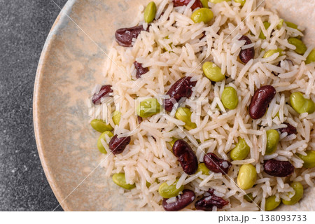 Asian food with rice, edamame, carrots, tofu, and spices. Rice with edamame 138093733