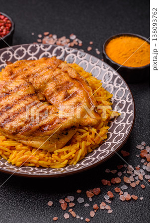 Kabsa or haneeth, an Arabic dish with rice and chicken, salt, and spices. Kabsa or haneeth Kabsa or haneeth, an Arabic dish with rice and chicken, salt, and spices. Kabsa or haneeth 138093762