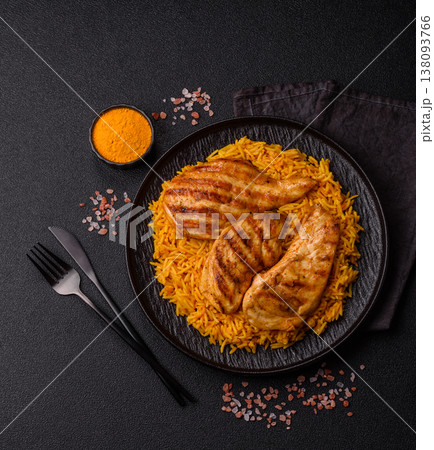 Kabsa or haneeth, an Arabic dish with rice and chicken, salt, and spices. Kabsa or haneeth Kabsa or haneeth, an Arabic dish with rice and chicken, salt, and spices. Kabsa or haneeth 138093766