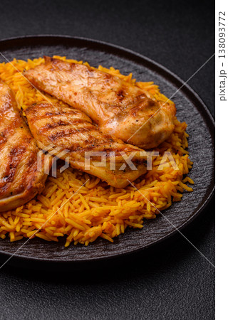 Kabsa or haneeth, an Arabic dish with rice and chicken, salt, and spices. Kabsa or haneeth 138093772