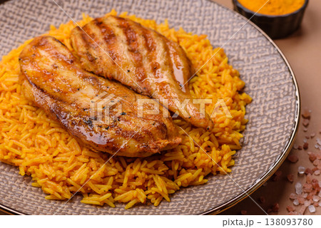 Kabsa or haneeth, an Arabic dish with rice and chicken, salt, and spices. Kabsa or haneeth 138093780