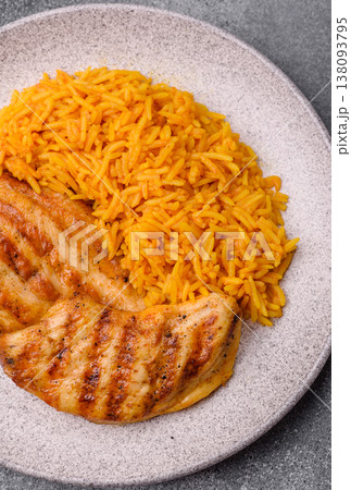 Dajaj Mashwi, an Arabic dish with rice and chicken, salt, and spices. Dajaj Mashwi as a background Dajaj Mashwi, an Arabic dish with rice and chicken, salt, and spices. Dajaj Mashwi as a background 138093795