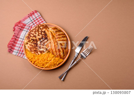 Dajaj Mashwi, an Arabic dish with rice and chicken, salt, and spices. Dajaj Mashwi as a background 138093807