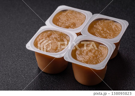 Apple sweet sauce, baby food, canned ingredient for desserts. Apple sauce 138093823