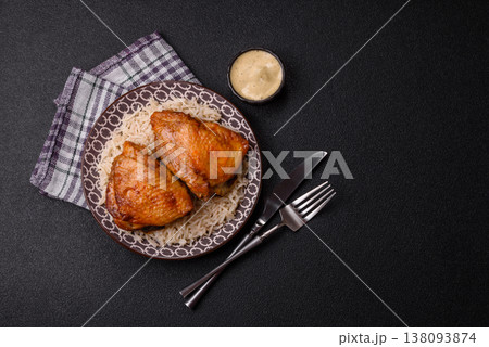 Kabsa or haneeth, an Arabic dish with rice and chicken, salt, and spices. Kabsa or haneeth 138093874