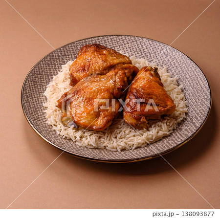 Kabsa or haneeth, an Arabic dish with rice and chicken, salt, and spices. Kabsa or haneeth 138093877