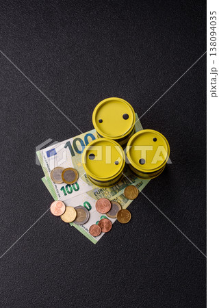 A barrel of oil against a backdrop of euro as a concept for the oil crisis. A barrel of oil A barrel of oil against a backdrop of euro as a concept for the oil crisis. A barrel of oil 138094035