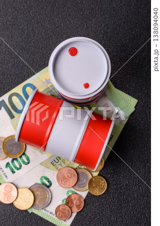 A barrel of oil against a backdrop of euro as a concept for the oil crisis. A barrel of oil A barrel of oil against a backdrop of euro as a concept for the oil crisis. A barrel of oil 138094040