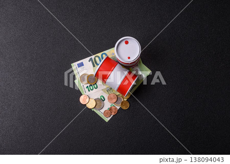 A barrel of oil against a backdrop of euro as a concept for the oil crisis. A barrel of oil A barrel of oil against a backdrop of euro as a concept for the oil crisis. A barrel of oil 138094043