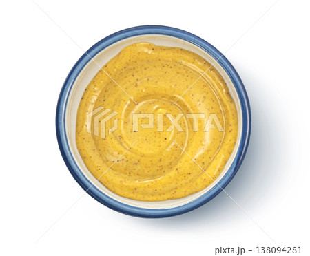 Mustard sauce swirl in ceramic bowl isolated on white background, full depth of field, top view Mustard sauce swirl in ceramic bowl isolated on white background, full depth of field, top view 138094281