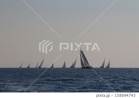 Sailboats sail in windy weather in the blue waters of the Aegean Sea, on the shores of the famous holiday destination Bodrum. Sailboats sail in windy weather in the blue waters of the Aegean Sea, on the shores of the famous holiday destination Bodrum. 138094743