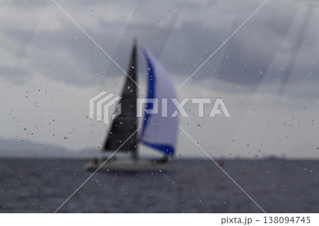 Sailboats sail in windy weather in the blue waters of the Aegean Sea, on the shores of the famous holiday destination Bodrum. Sailboats sail in windy weather in the blue waters of the Aegean Sea, on the shores of the famous holiday destination Bodrum. 138094745