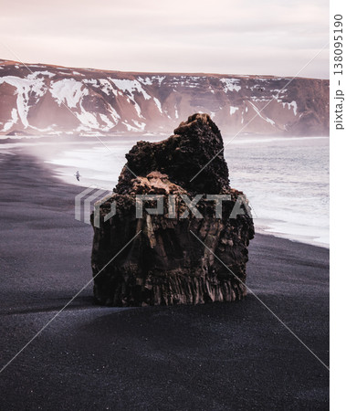 Arnardrangur sea stack on Reynisfjara black sand beach, South Iceland. 138095190