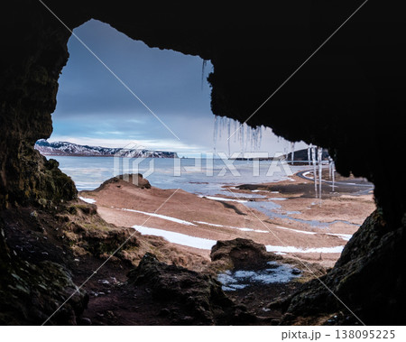 View from Loftsalahellir cave with Reynisdrangar sea stacks in the background, South Iceland View from Loftsalahellir cave with Reynisdrangar sea stacks in the background, South Iceland 138095225