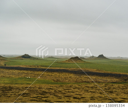 Volcanic craters of Alftaversgigar surrounded by green fields, South Iceland. Volcanic craters of Alftaversgigar surrounded by green fields, South Iceland. 138095334