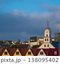 Early evening in Thorshavn with colorful roofs and church steeple. 138095402