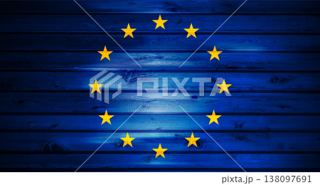 Colors and stars of the European union flag on a wooden grunge background 138097691