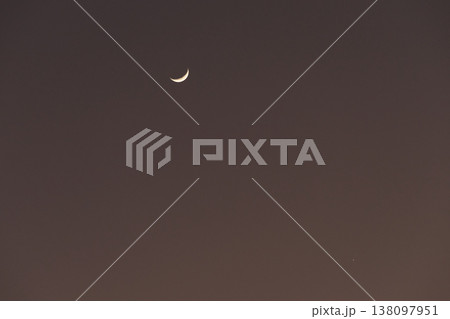 Night landscape, new moon, pink clouds Night landscape, new moon, pink clouds 138097951