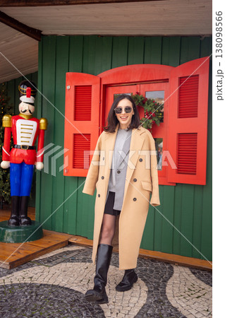 Woman walking sunny winter day European city 138098566