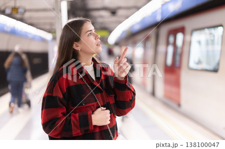 Woman changing to the subway 138100047