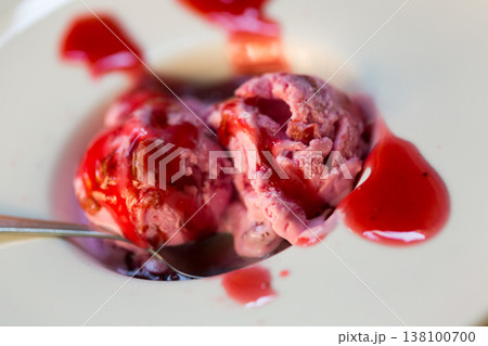 Ice cream with berry topping 138100700