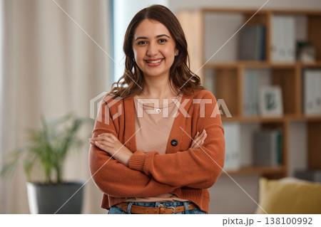 Happy woman, portrait and arms crossed of creative professional, freelancer or ambition at home. Female person smile in confidence, pride or proud for remote work or startup in living room at house 138100992