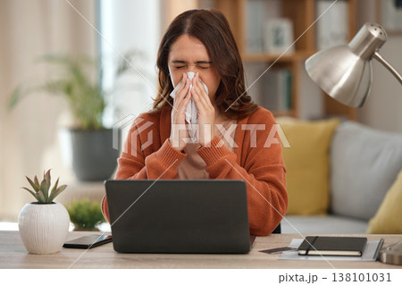 Woman, blowing nose and student with laptop, allergies or burnout with virus, fatigue and sick with sinus infection. Toilet paper, health fail and overworked with university assessment while at home Woman, blowing nose and student with laptop, allergies or burnout with virus, fatigue and sick with sinus infection. Toilet paper, health fail and overworked with university assessment while at home 138101031
