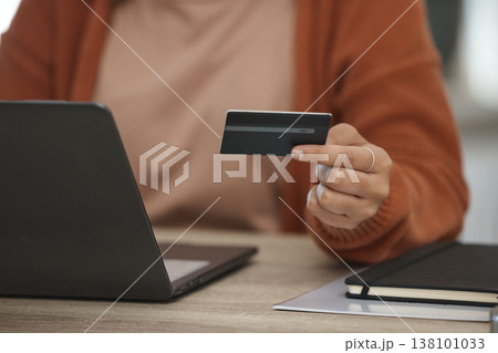 Closeup, woman and laptop with credit card, payment and online shopping with fintech, banking and transaction in a lounge. Person, home and girl with pc, ecommerce and digital app with investment Closeup, woman and laptop with credit card, payment and online shopping with fintech, banking and transaction in a lounge. Person, home and girl with pc, ecommerce and digital app with investment 138101033
