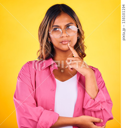 Thinking, inspiration and woman in glasses with ideas in studio, future or dream with solution on yellow background. Decision, question with problem solving and insight with memory for brainstorming 138101194