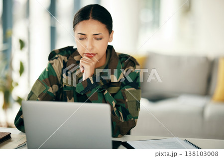 Laptop, serious soldier and woman in home, planning and problem solving. Computer, veteran on internet and technology online to search, thinking of army idea and reading military email in living room 138103008